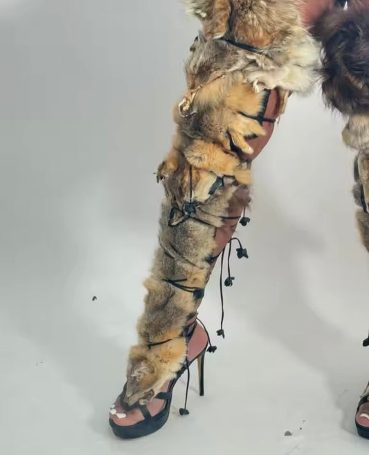 La Sauvage thigh high heels